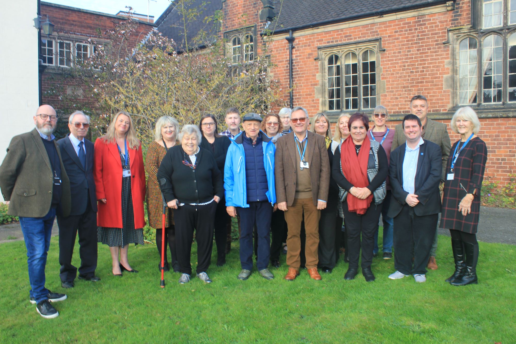 A picture of the attendees to the CAB event in the garden at District Council House.