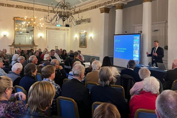 A picture of Doug Pullen addressing residents at the Meet The Leader event.