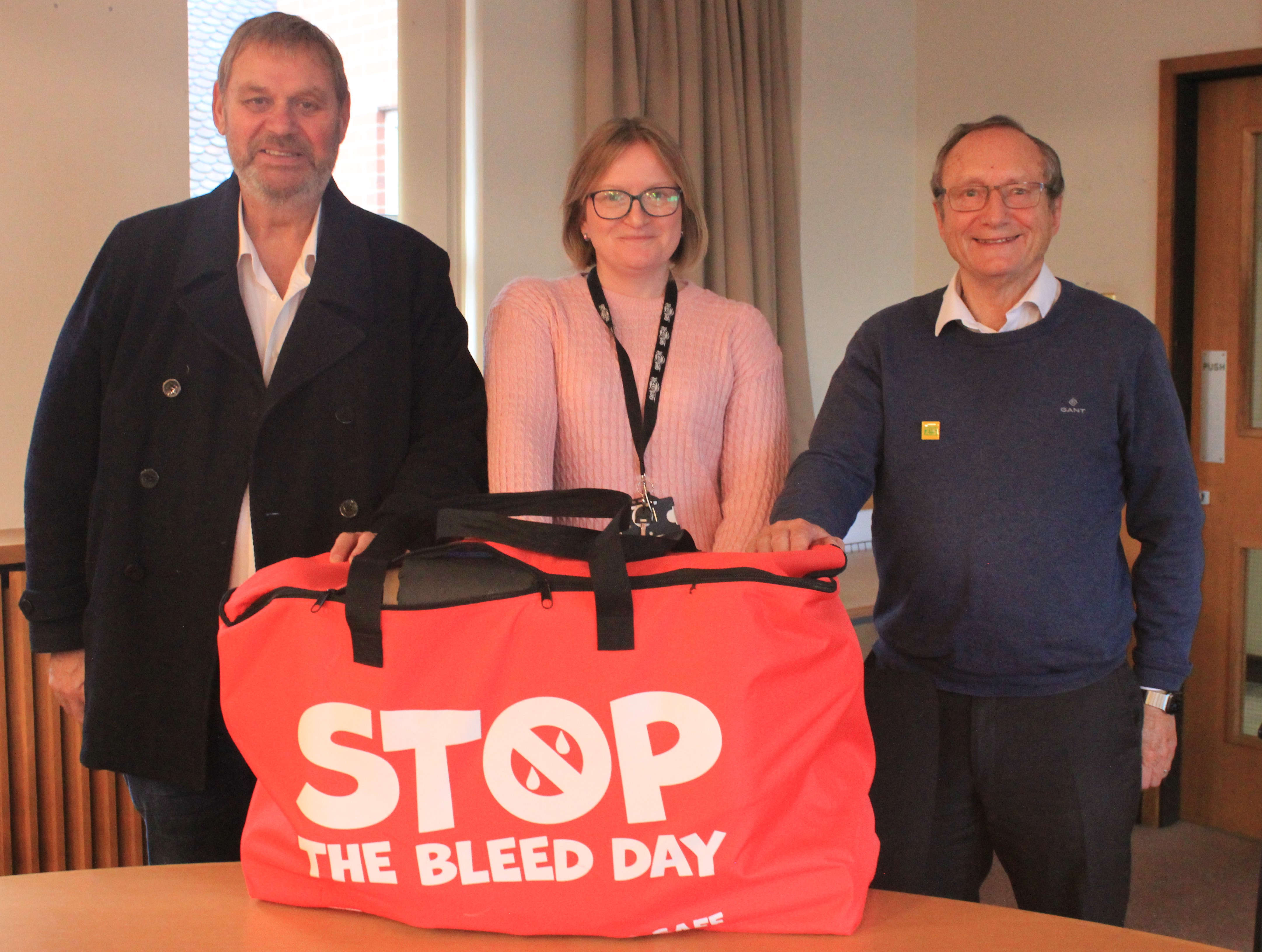 A pictured of (from left) Mike Robinson, Operations Manager for Citizen Aid, Lichfield District Council’s Principal Community Safety Officer, Yvonne James and Sir Keith Porter of Citizen Aid.